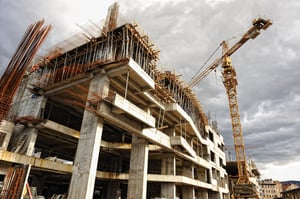 Construction site with crane and building