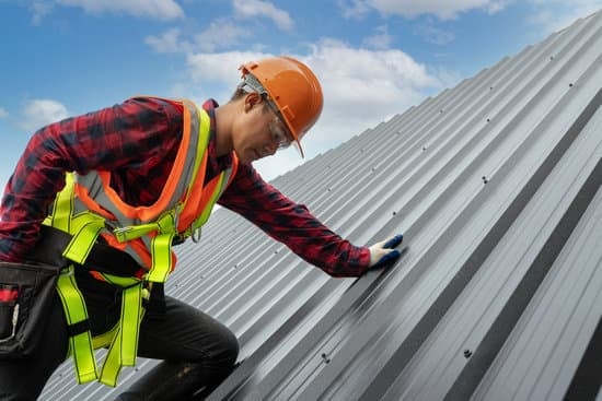 roofer inspecting IMP's