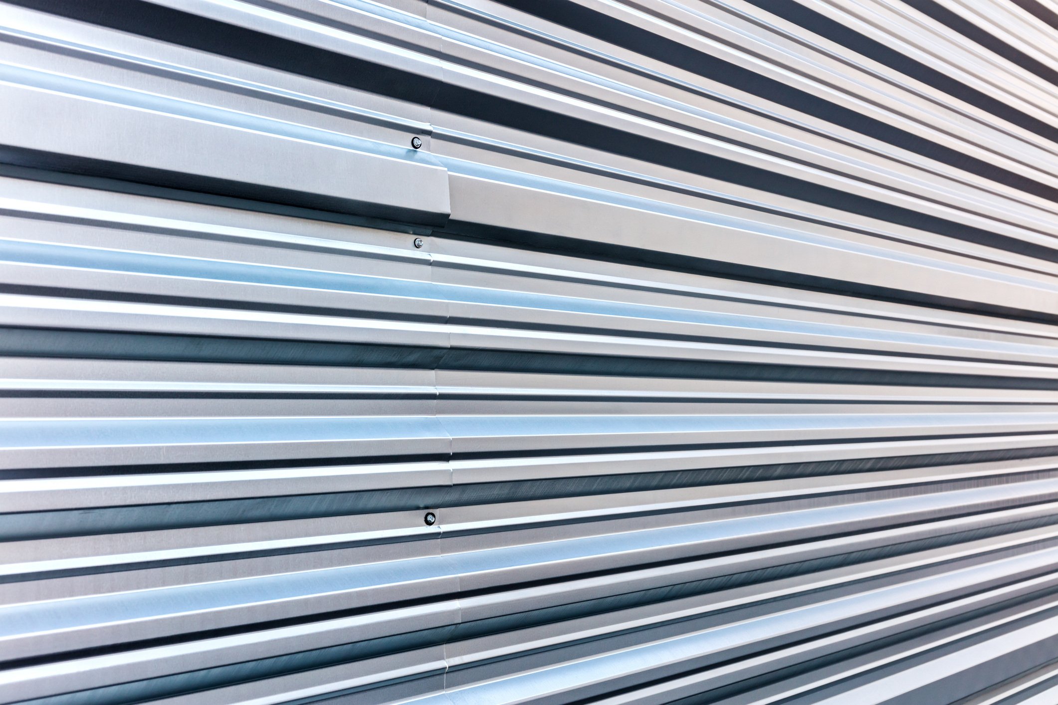 Grey metal wall of industrial building