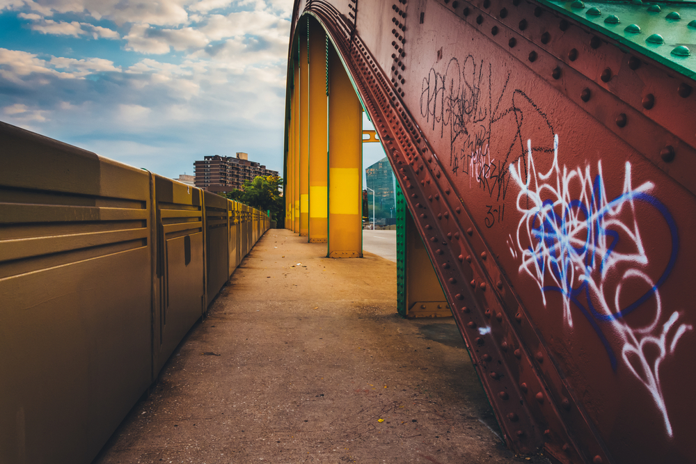 Graffiti on the side of the colorful Howard Street Bridge in Baltimore, Maryland.